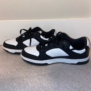 black and white andis shoes